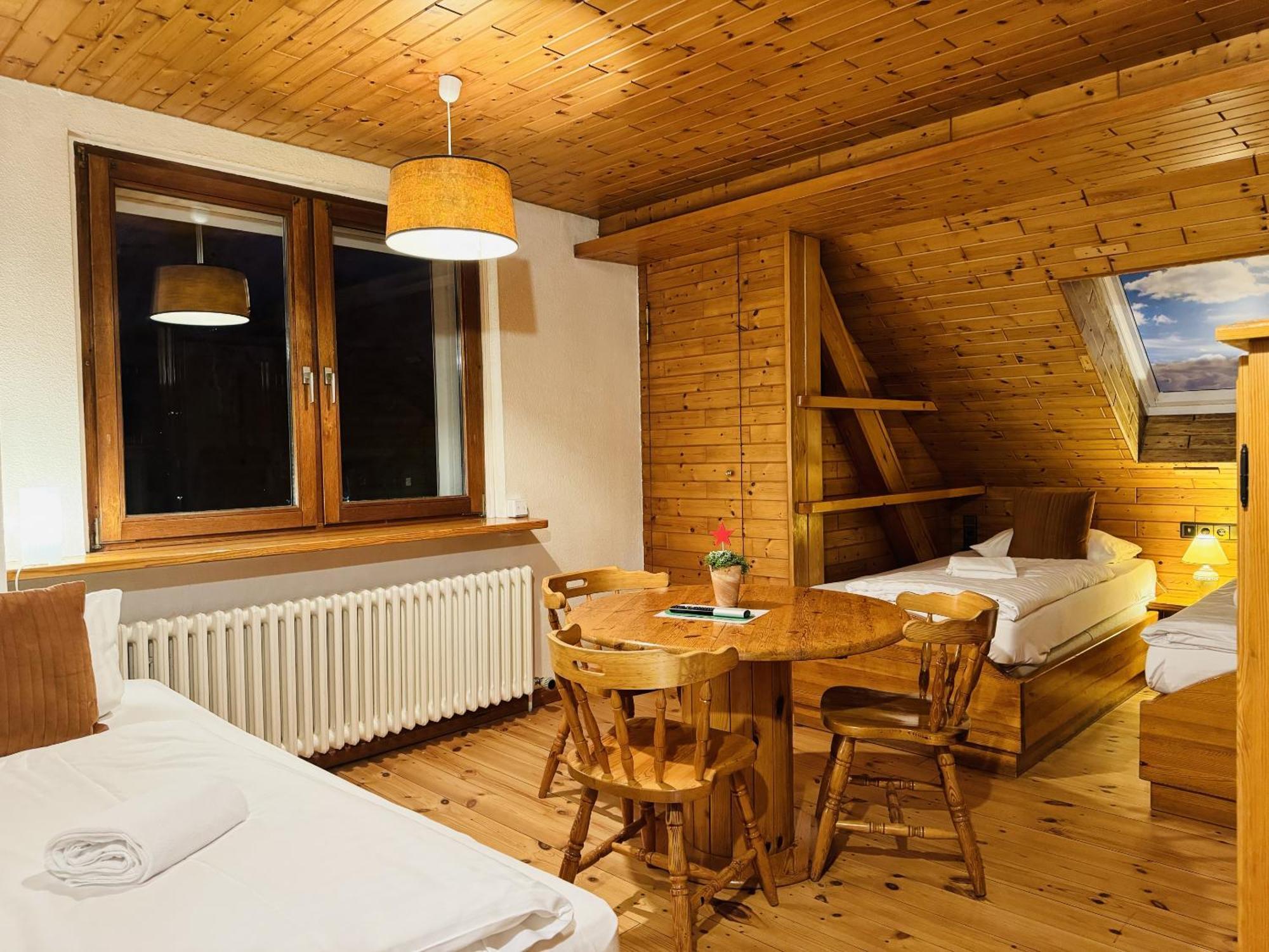 Classic Dreibettzimmer